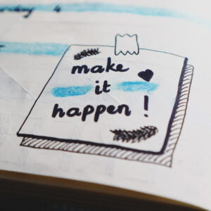 Hand-drawn illustration of the words Make It Happen.